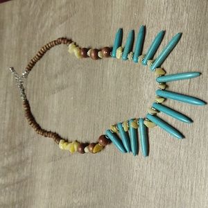 Turquoise stone, stones, and wooden feel necklace.